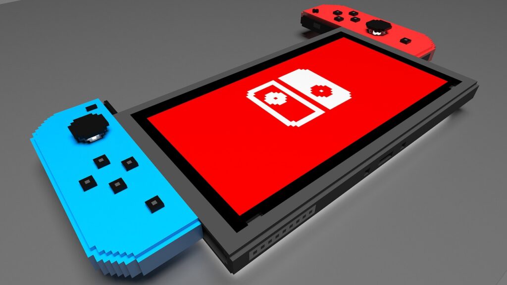 Nintendo Switch s snemljivimi krmilniki. FOTO: kenyy/Pixabay