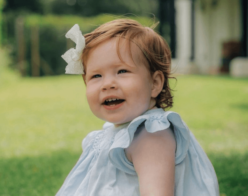 Princ Harry in Meghan praznujeta - komu je podobna mala Lilibet?